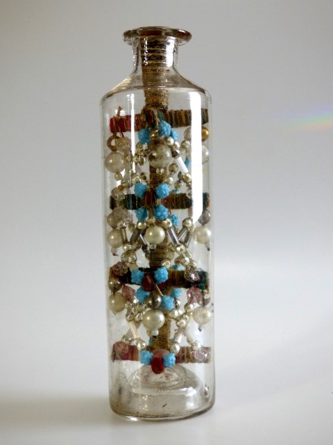 Winder with Glass Beads in a Bottle